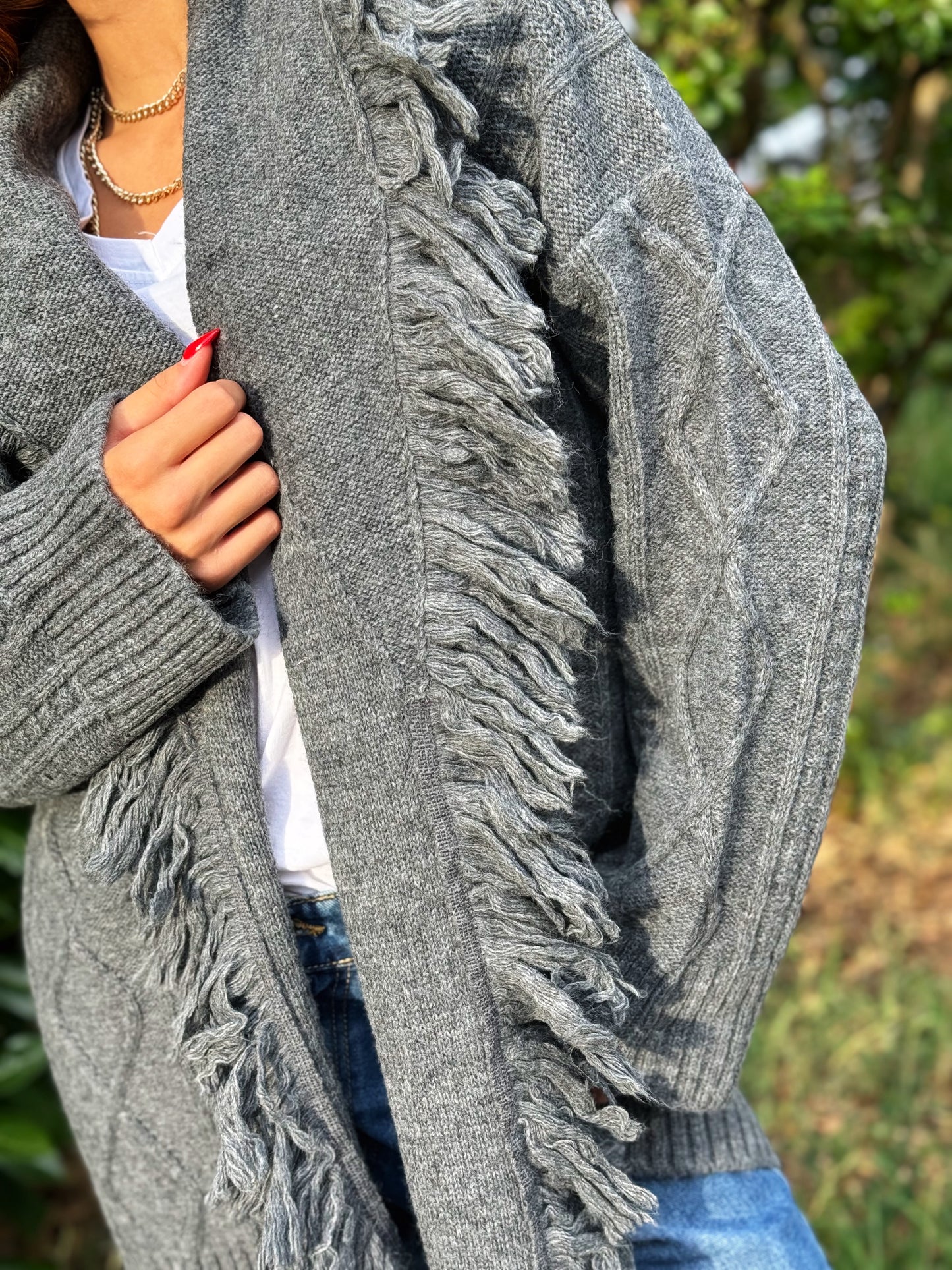 “CARDIGAN FRANGE” Kontatto