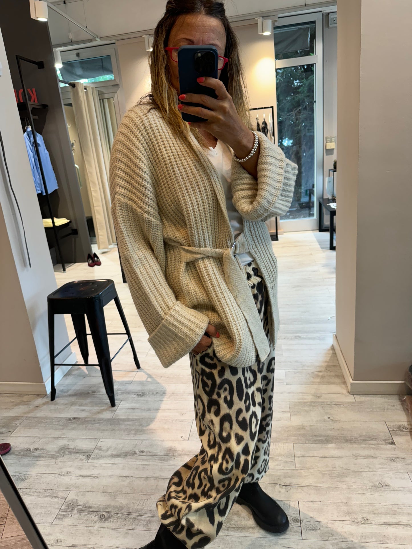 “CARDIGAN CON CINTURA” kontatto