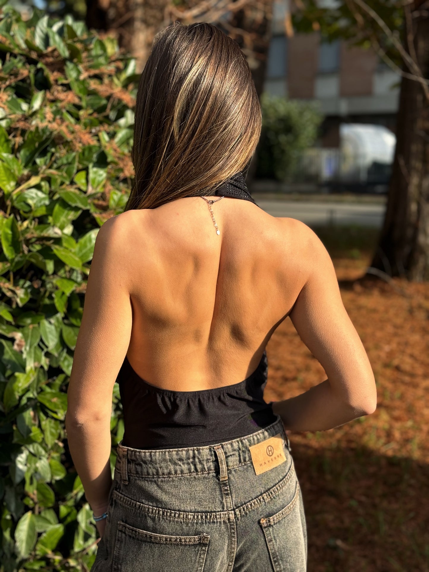 “BODY SCOLLO GRONDA STRASS” Kontatto