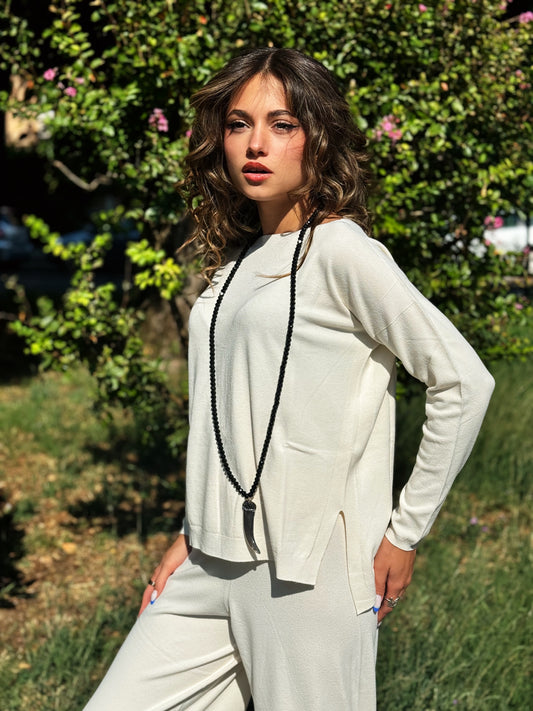 “MAGLIA CON SPACCHI LATERALI IN VISCOSA” kontatto
