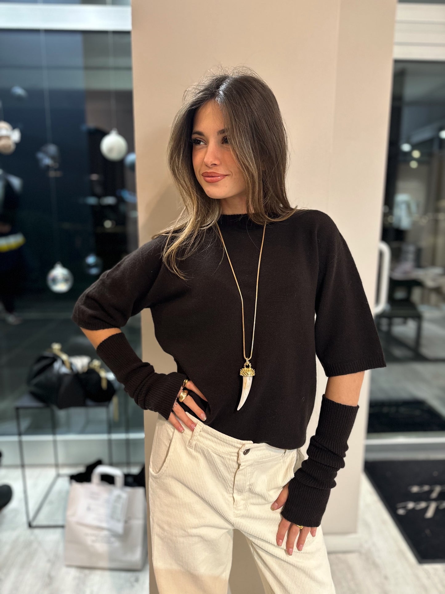 “MAGLIA GIROCOLLO CON MANICOTTI” Kontatto