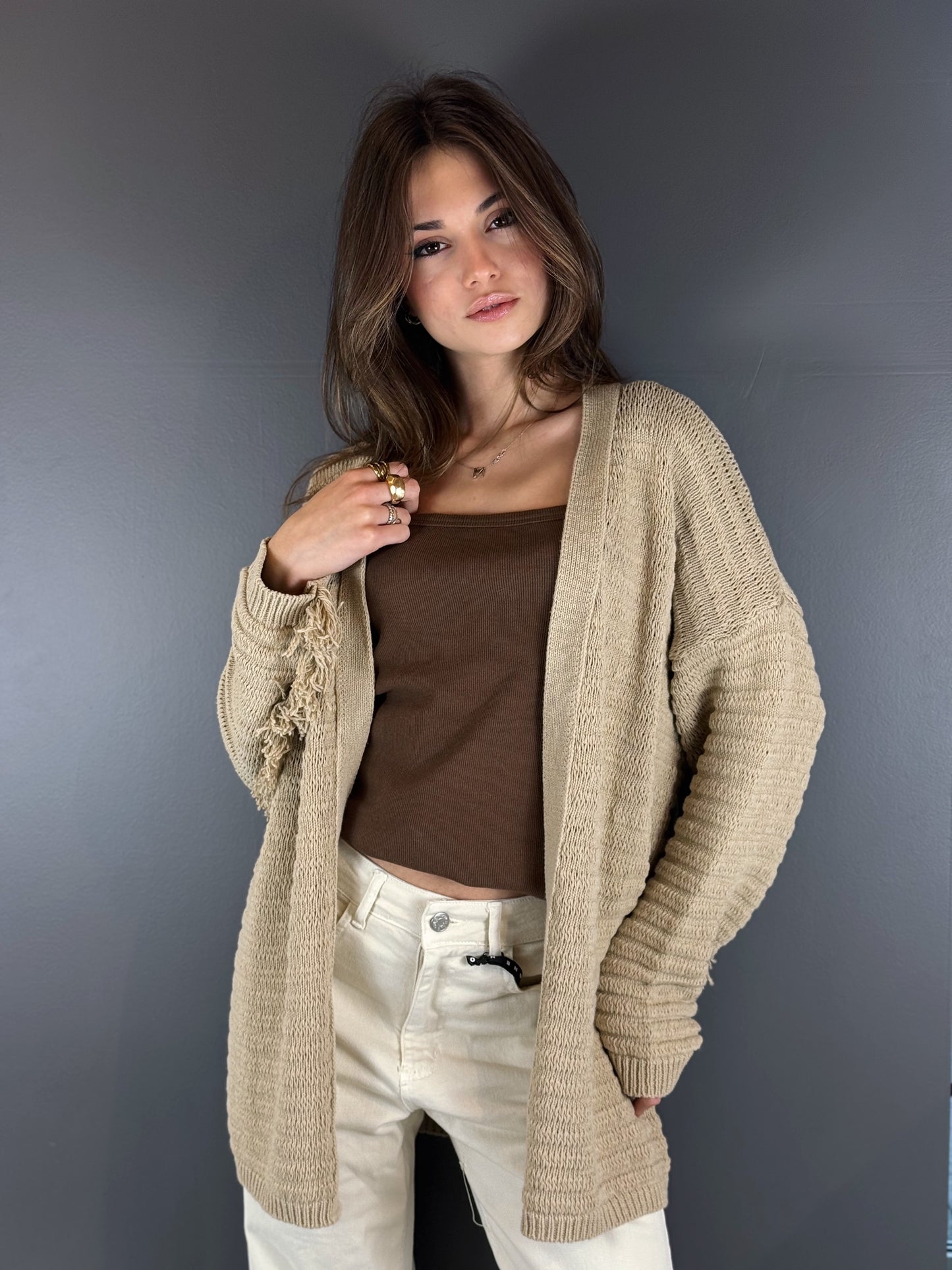 “CARDIGAN FRANGE” Kontatto