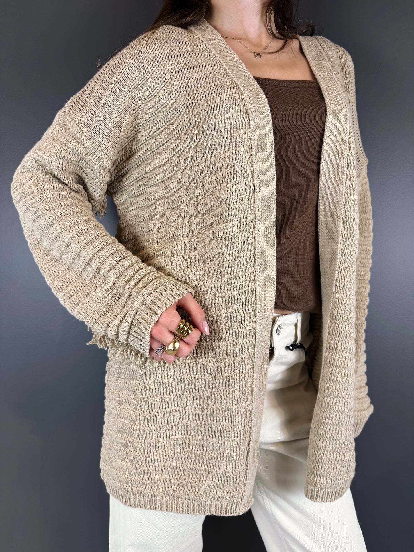 “CARDIGAN FRANGE” Kontatto