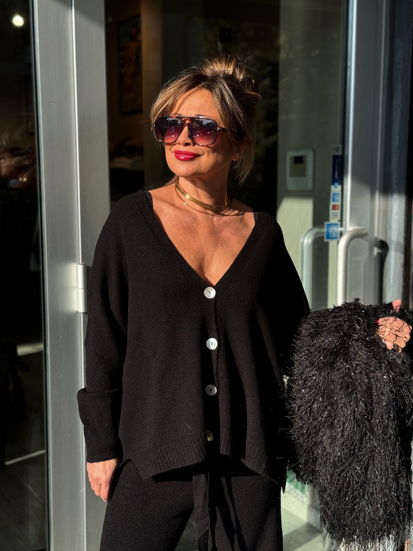 “CARDIGAN CON BOTTONI” kontatto