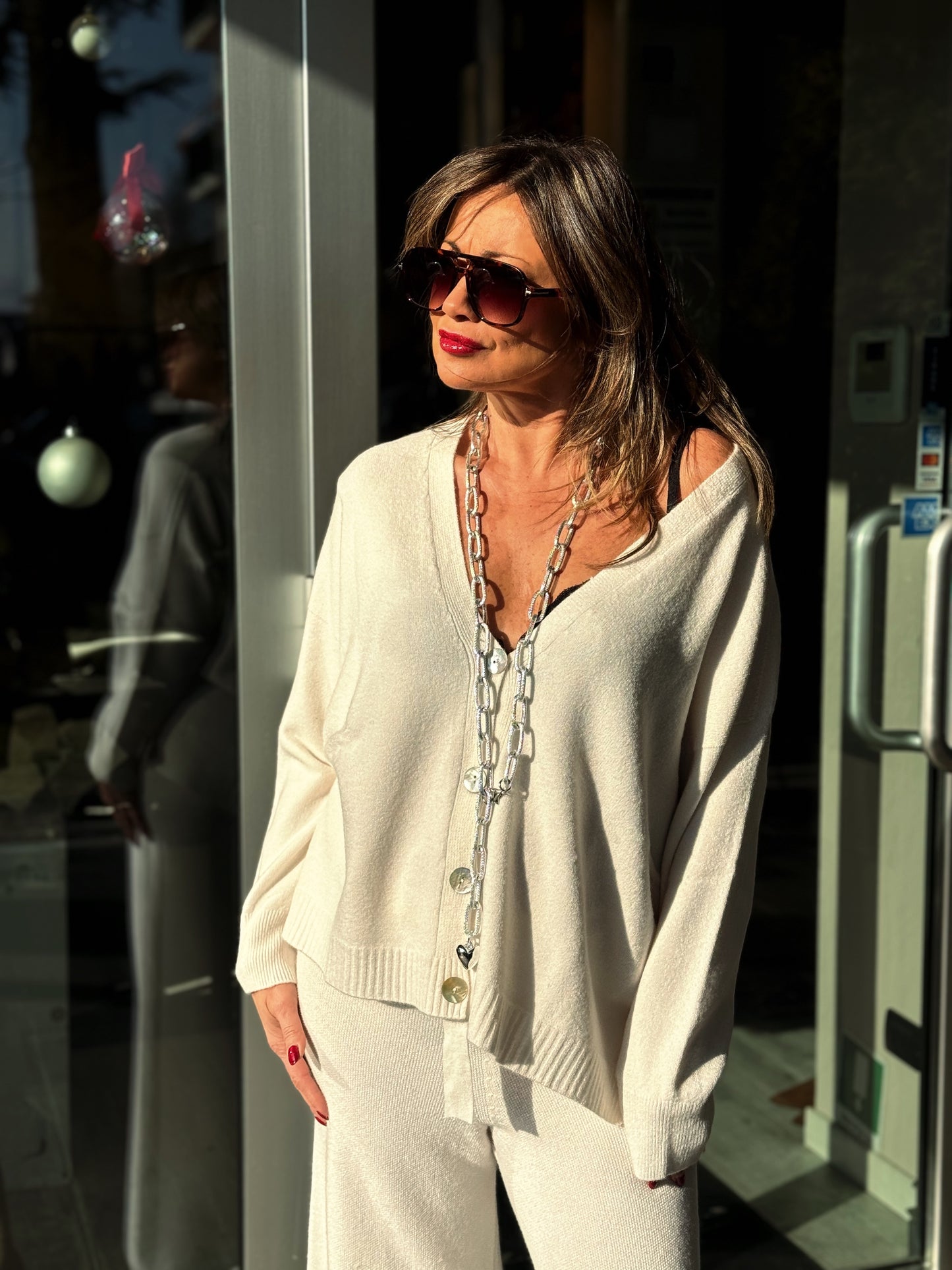 “CARDIGAN CON BOTTONI” kontatto